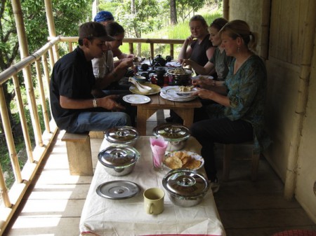 Foreign visitors enjoy a local meal in Mineral Spring  